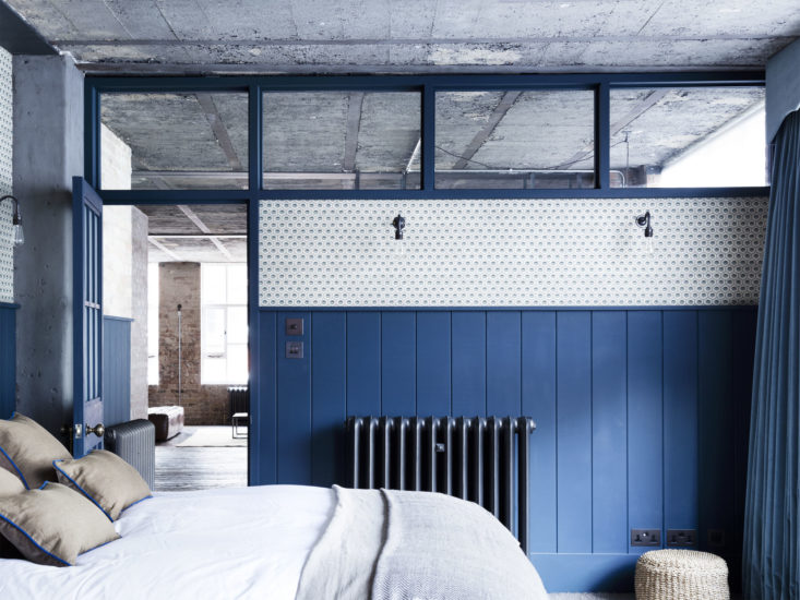 Mark-Lewis-Interior-Design-Hoxton-Square-loft-blue-and-white-bedroom-tongue-and-groove-paneling-fan-lights-Rory-Gardener-photo-13-733×550