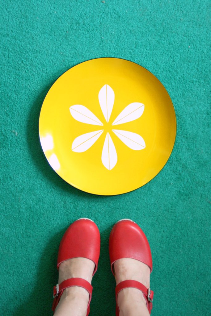 vintage-yellow-cathrineholm-lotus-plate-and-red-clogs-1-683×1024-2